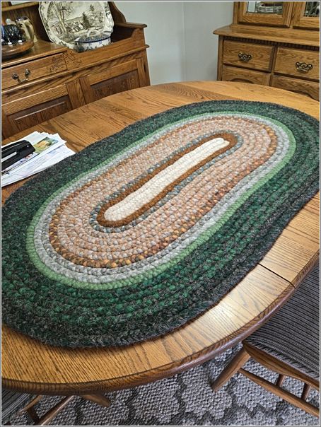 Here on Lettys dining table is a close-up of a portion of her beautiful rug shown on the cover page.